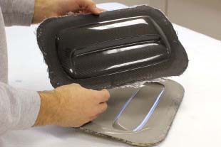This bonnet scoop has a high gloss finish straight out of the mould